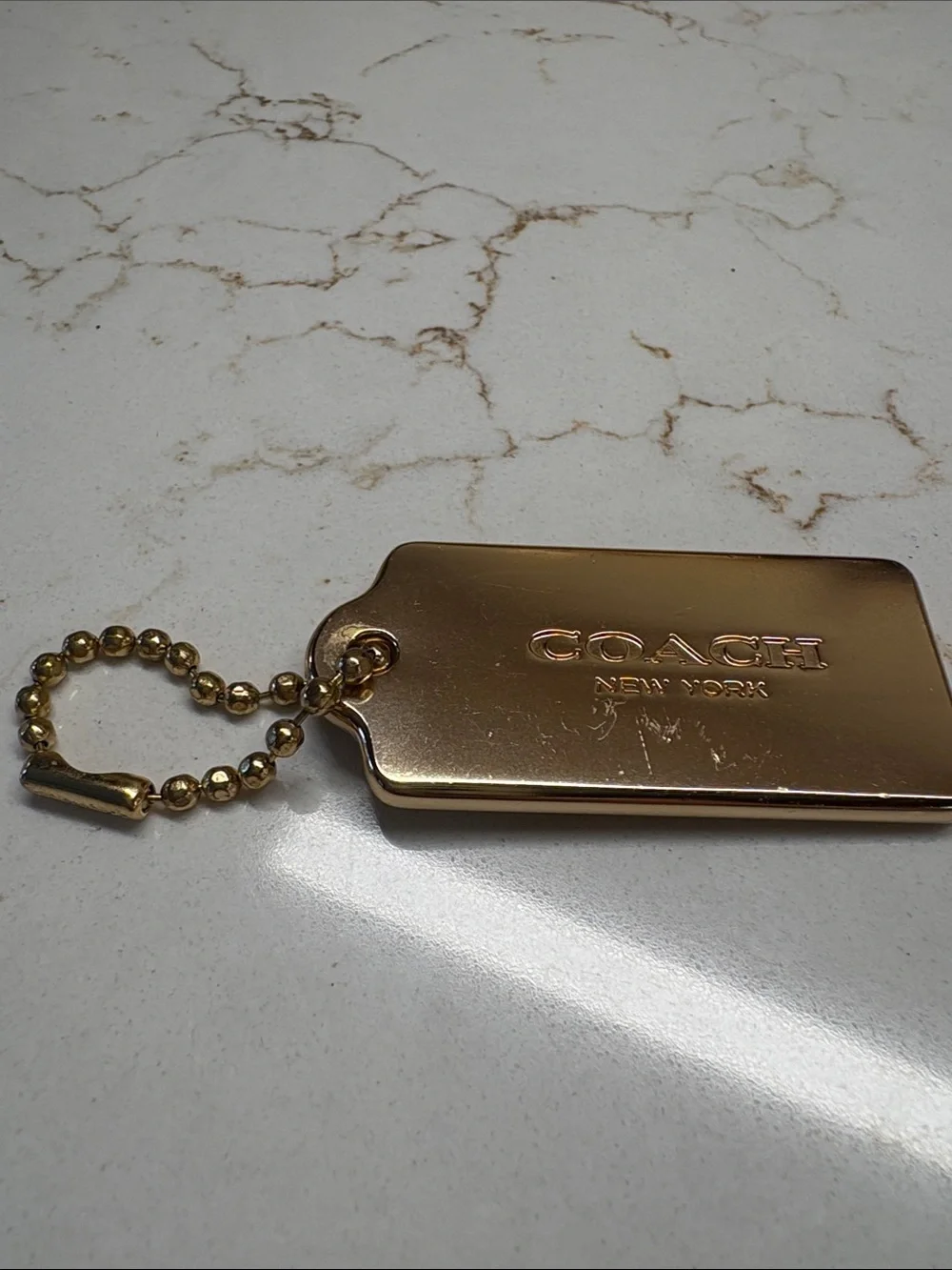 Coach Gold Metal Hangtag